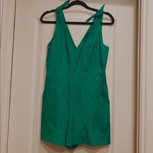 Green romper.
